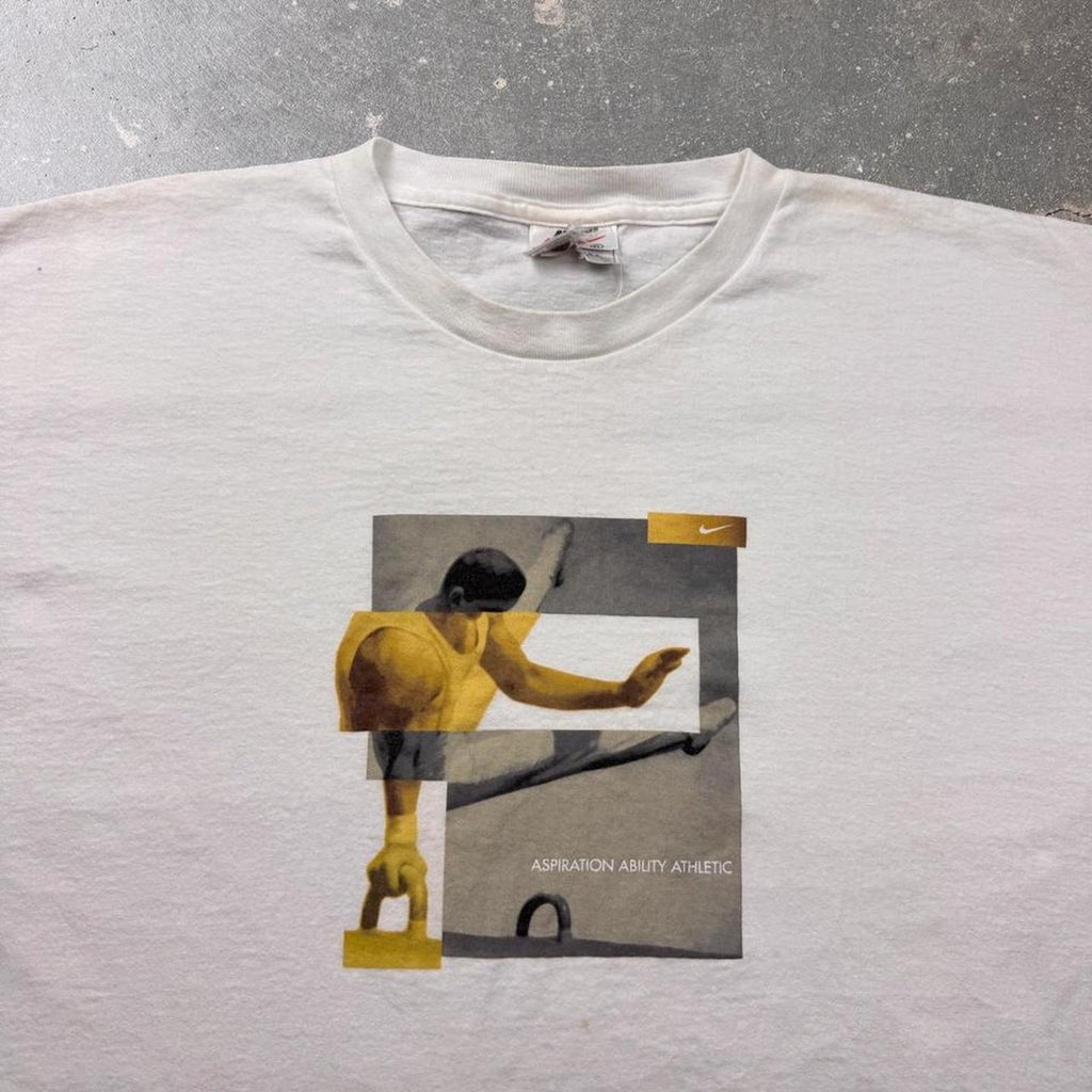 1990s Nike Gymnastics Aspiration Ability Athletic Graphic Tee | XL