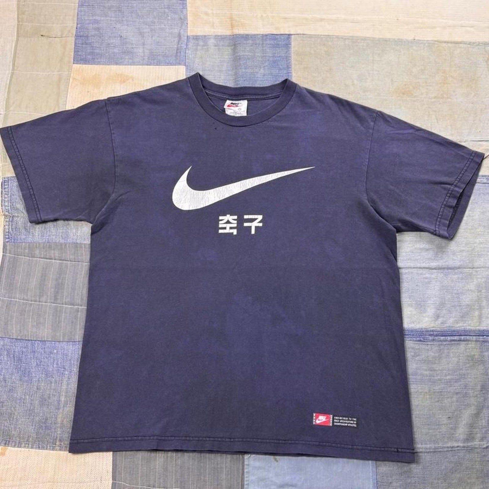 1990s Nike Korean Swoosh Graphic Tee | Medium