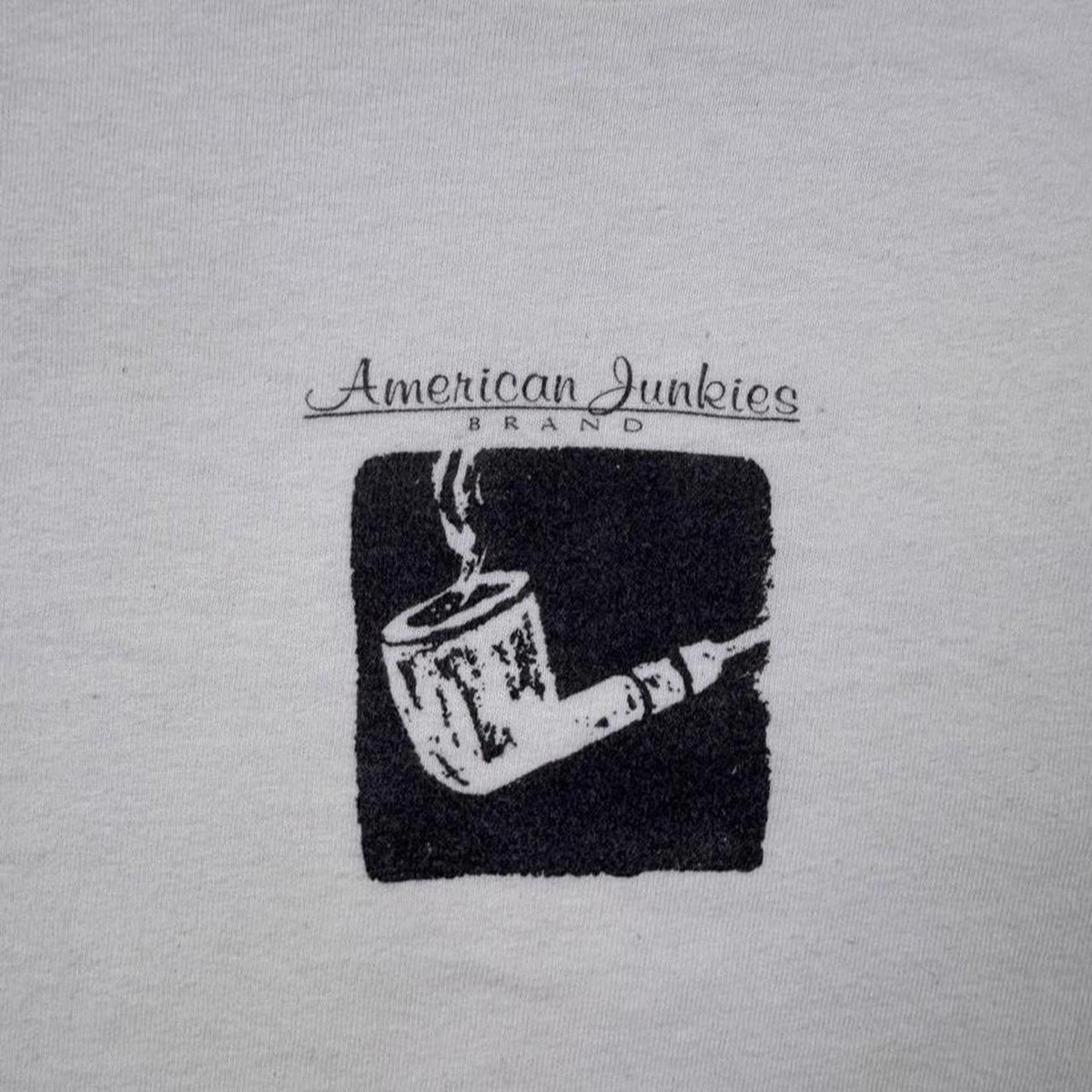American Junkies Brand Smoking Pipe White Graphic Tee | Medium
