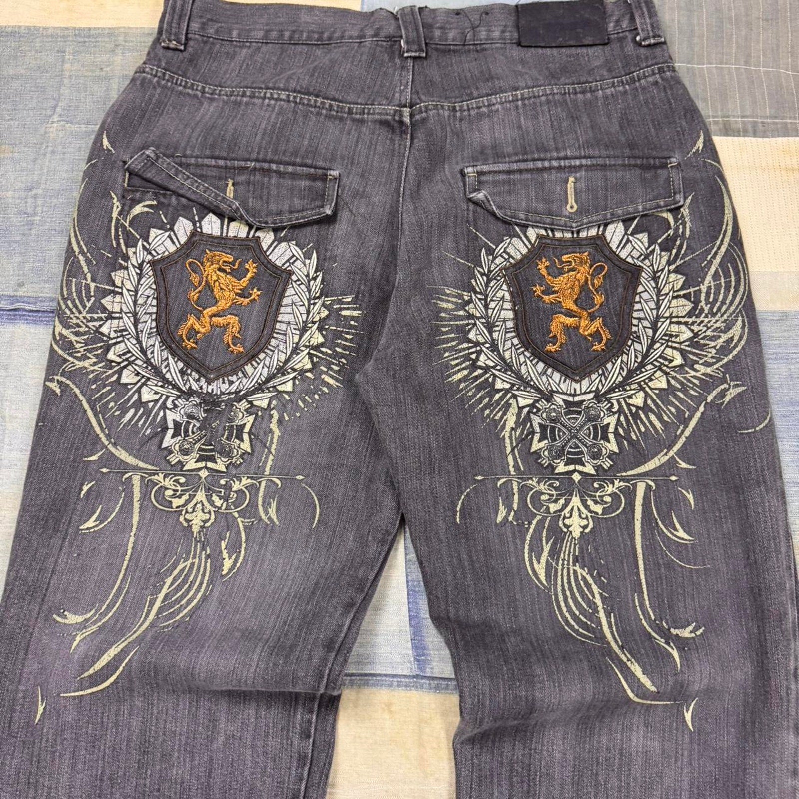 2000s embroidered jeans with lion design | 36x31