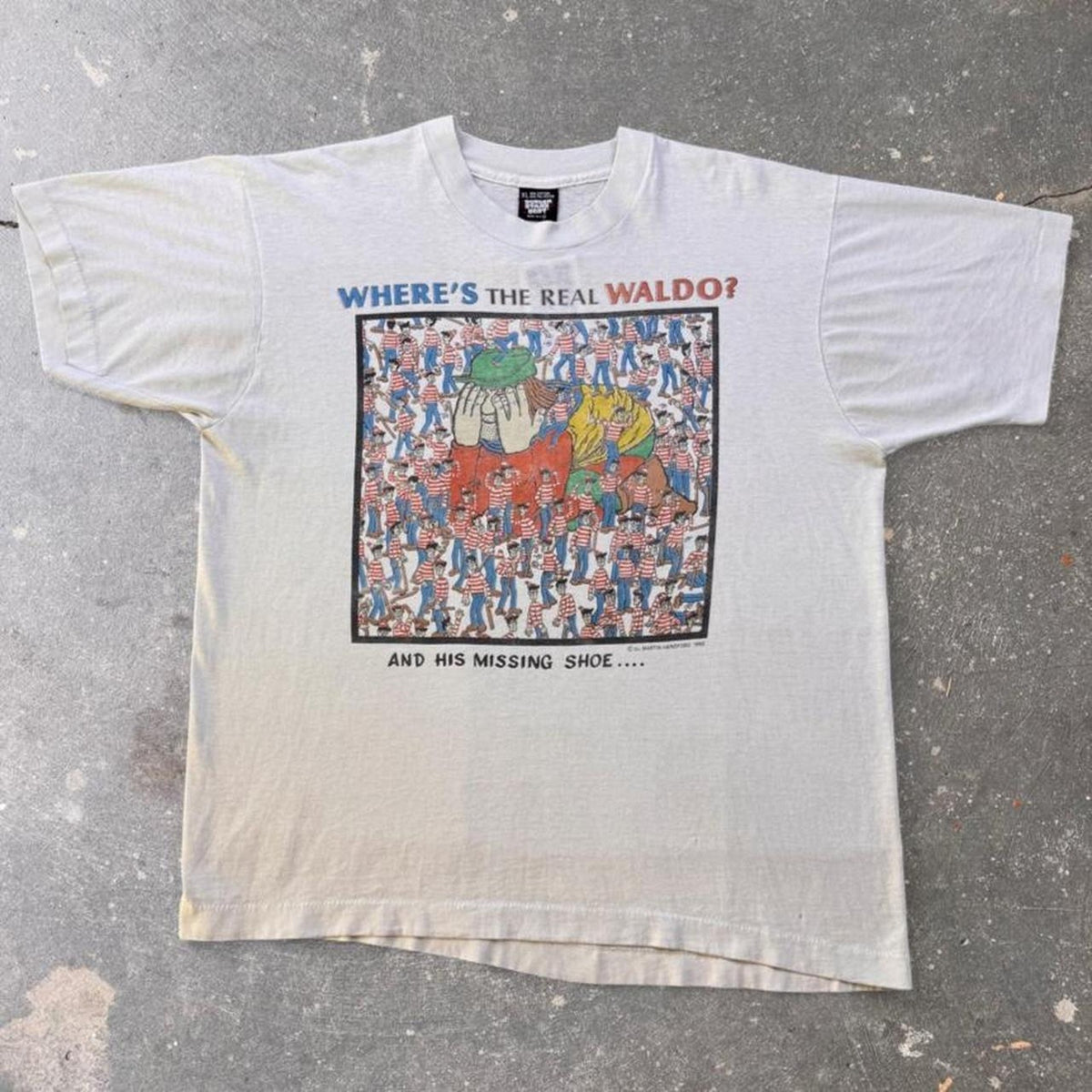 1990 Where's Waldo Missing Shoe Graphic Tee | XL