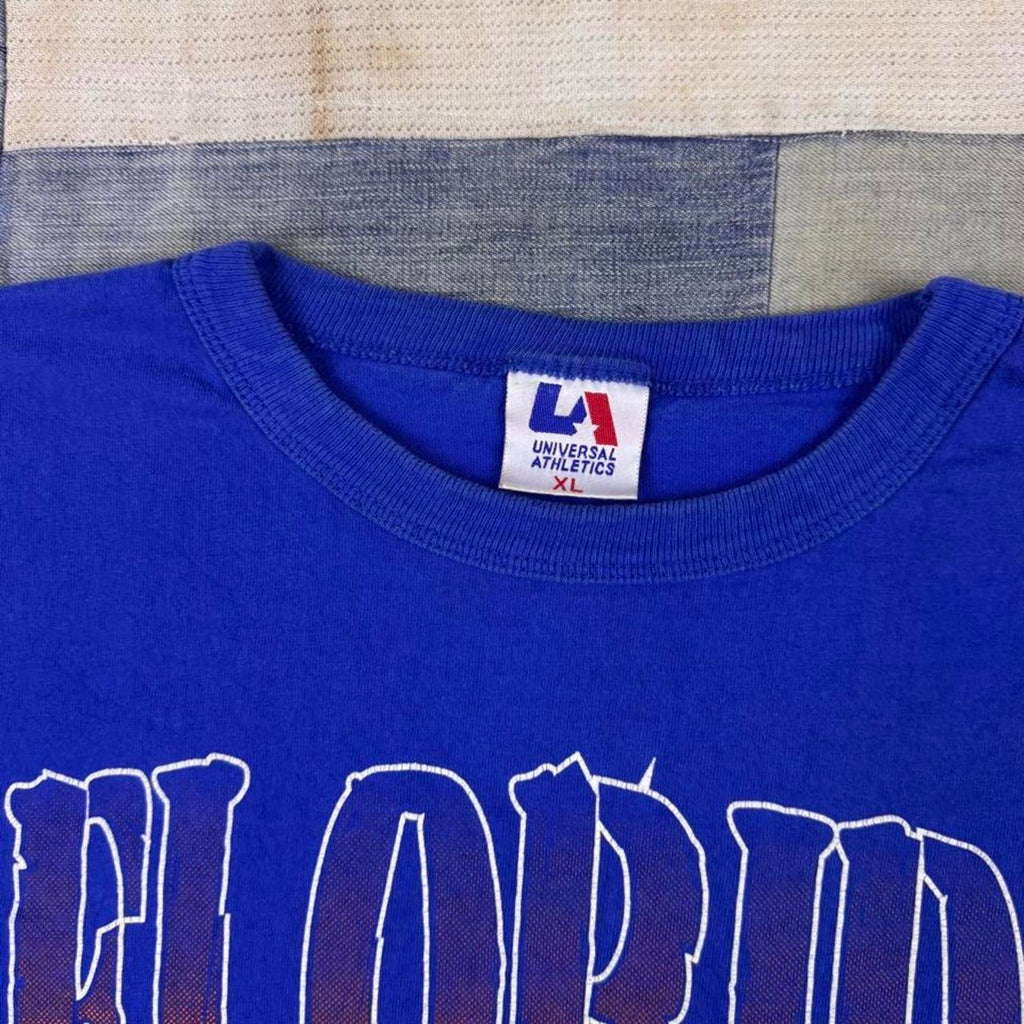 1990s Florida Gators Football Helmet Universal Athletics Graphic Tee Blue | XL
