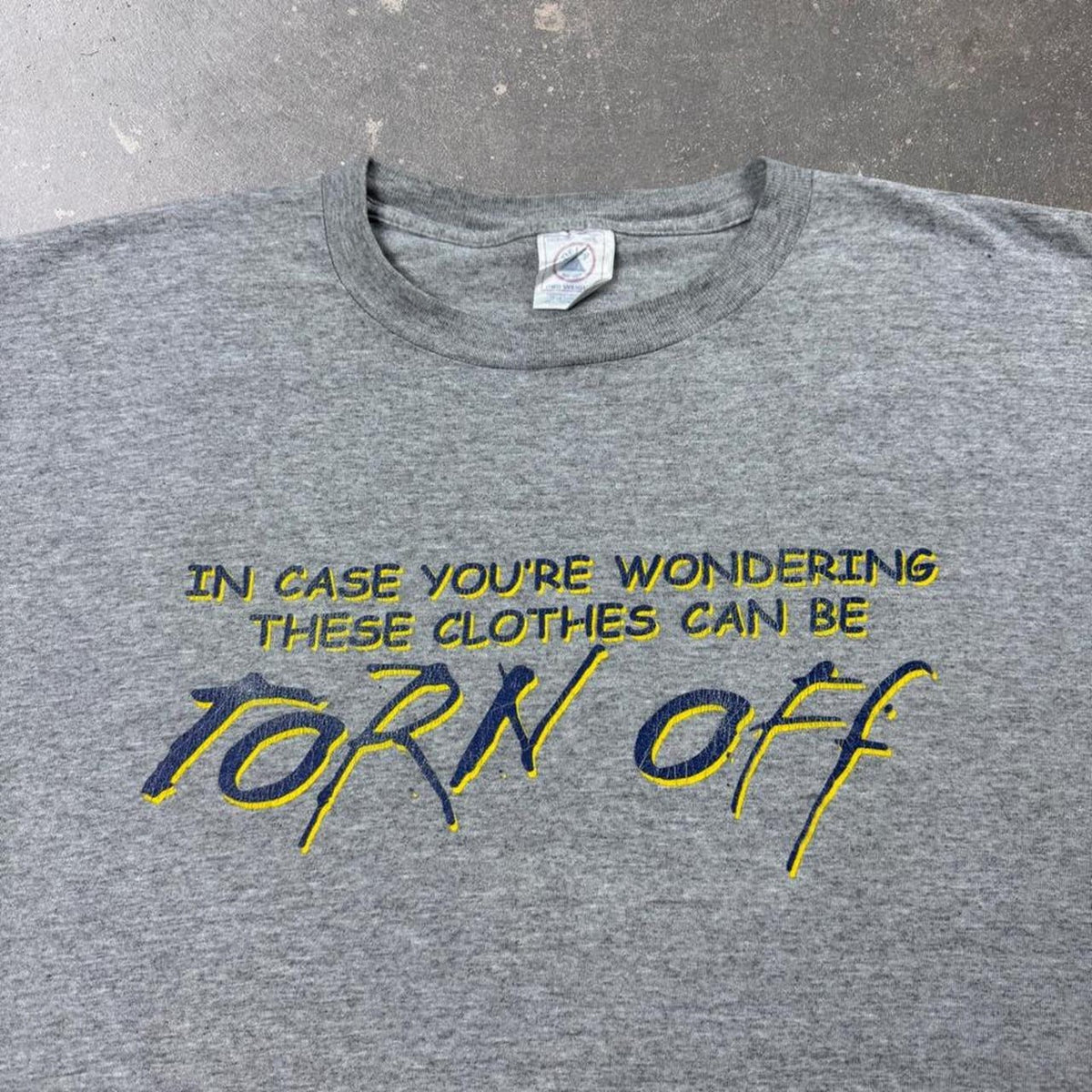 1990s “These Clothes Can Be Torn Off” Funny Slogan Tee | XL