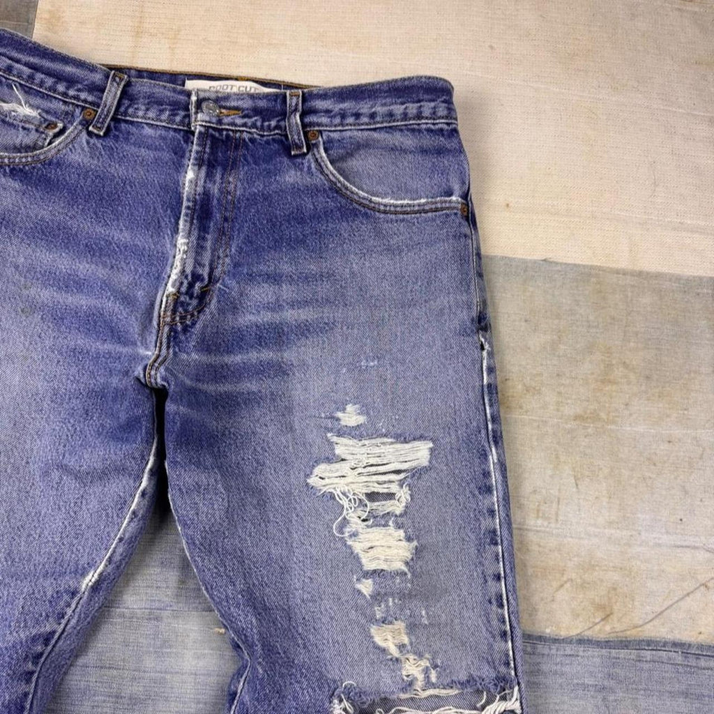 2000s Levi's 517 Boot Cut Distressed Faded Blue Denim Jeans Made in Dominican Republic | 32 x 28.5