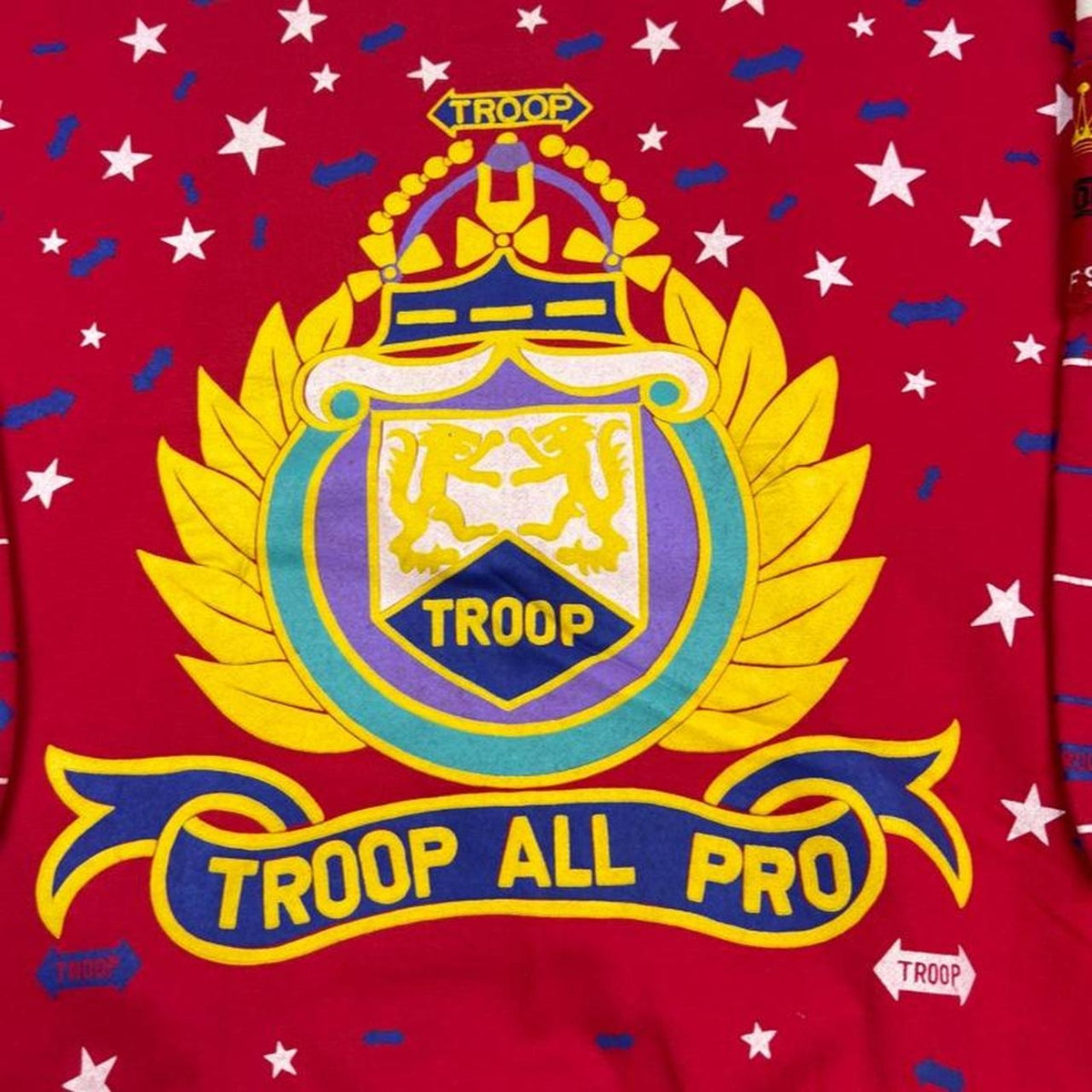 1990s Troop All Pro World of Sports Crest All Over Print Sweatshirt | Extra Large